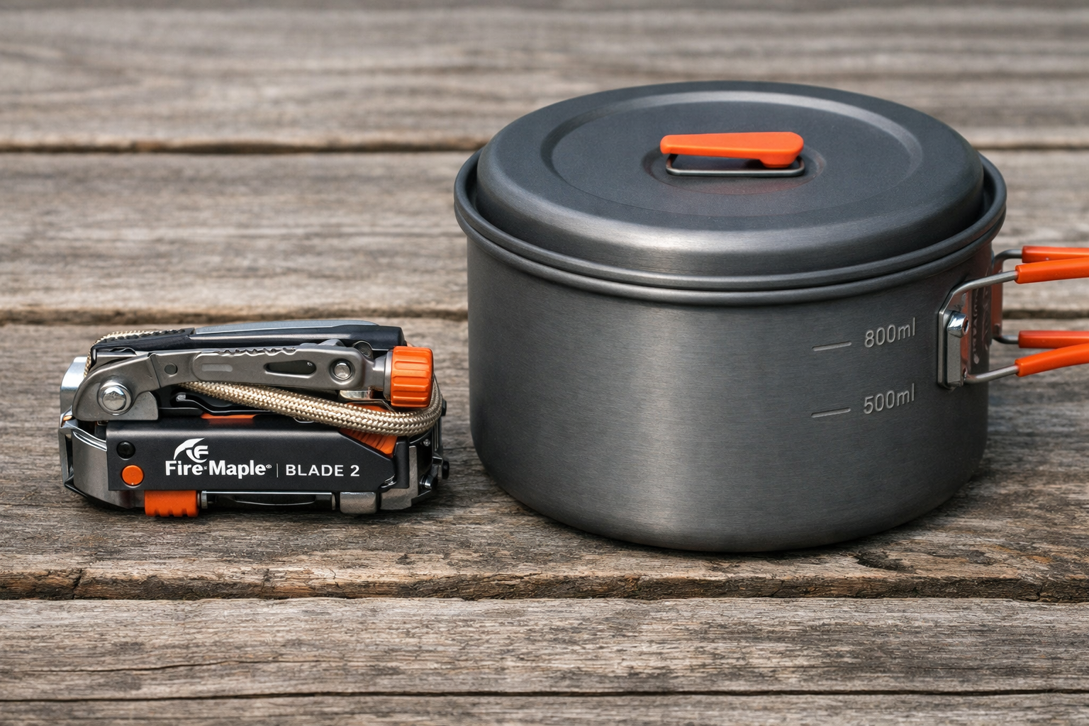 Fire Maple Blade 2 folded compact size next to camping pot for scale