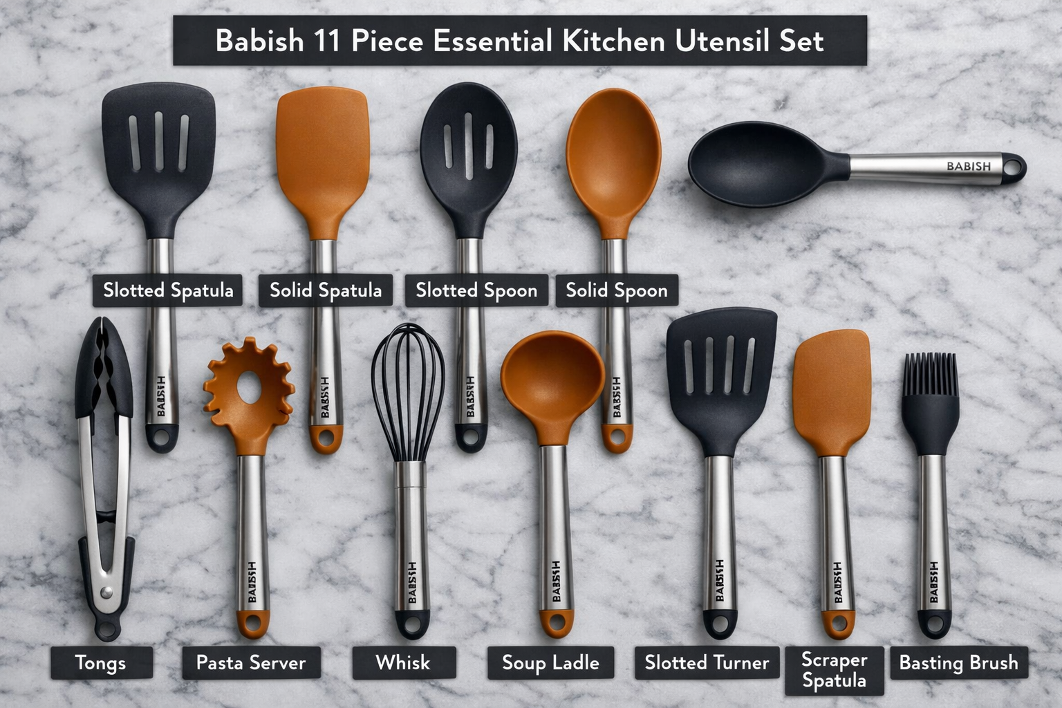 Detailed showcase of Babish 11 Piece Essential Silicone and Stainless Steel Kitchen Utensil Set with all eleven tools arranged in a flat-lay overhead shot on a marble countertop, each utensil labeled, showing the Babish branding on the handles and the distinctive silicone heads in deep charcoal and warm amber tones