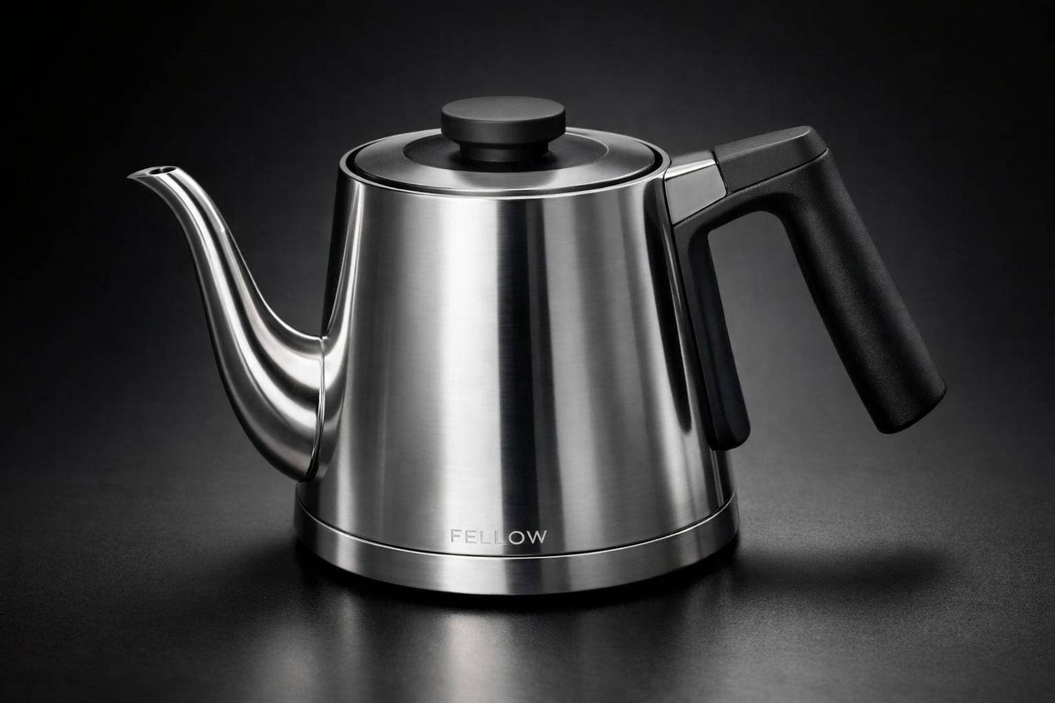 sleek Fellow Clyde kettle showing precision pour spout and ergonomic handle design, studio lighting highlighting stainless steel constructio