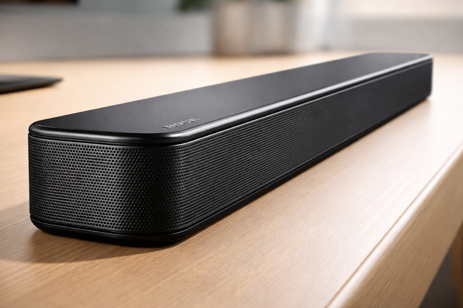 side angle showing Bose TV Speaker's slim profile and premium build quality
