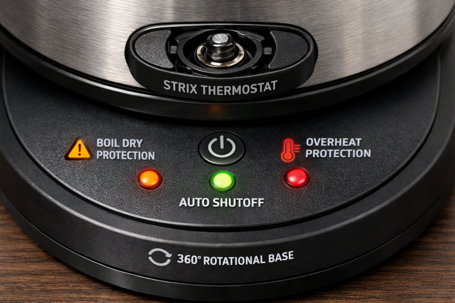close-up of Strix thermostat control system and auto shut-off safety features on electric kettle base