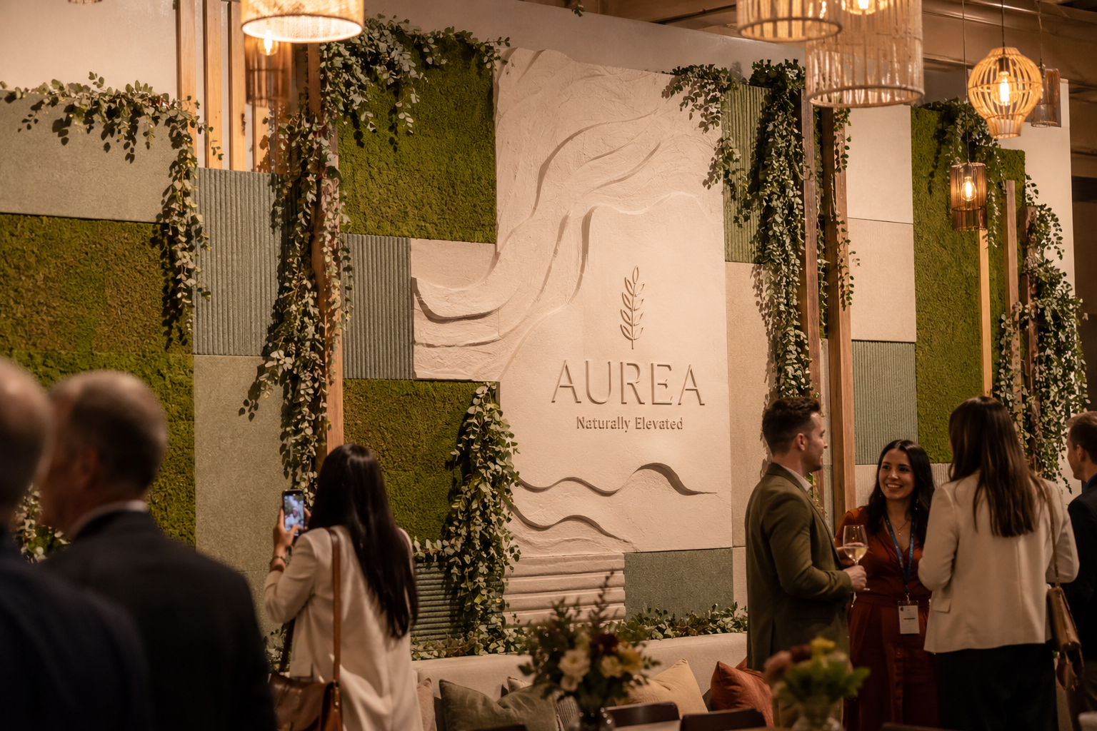() editorial photograph showing a full venue installation of a biophilic textured party wall at a corporate brand launch